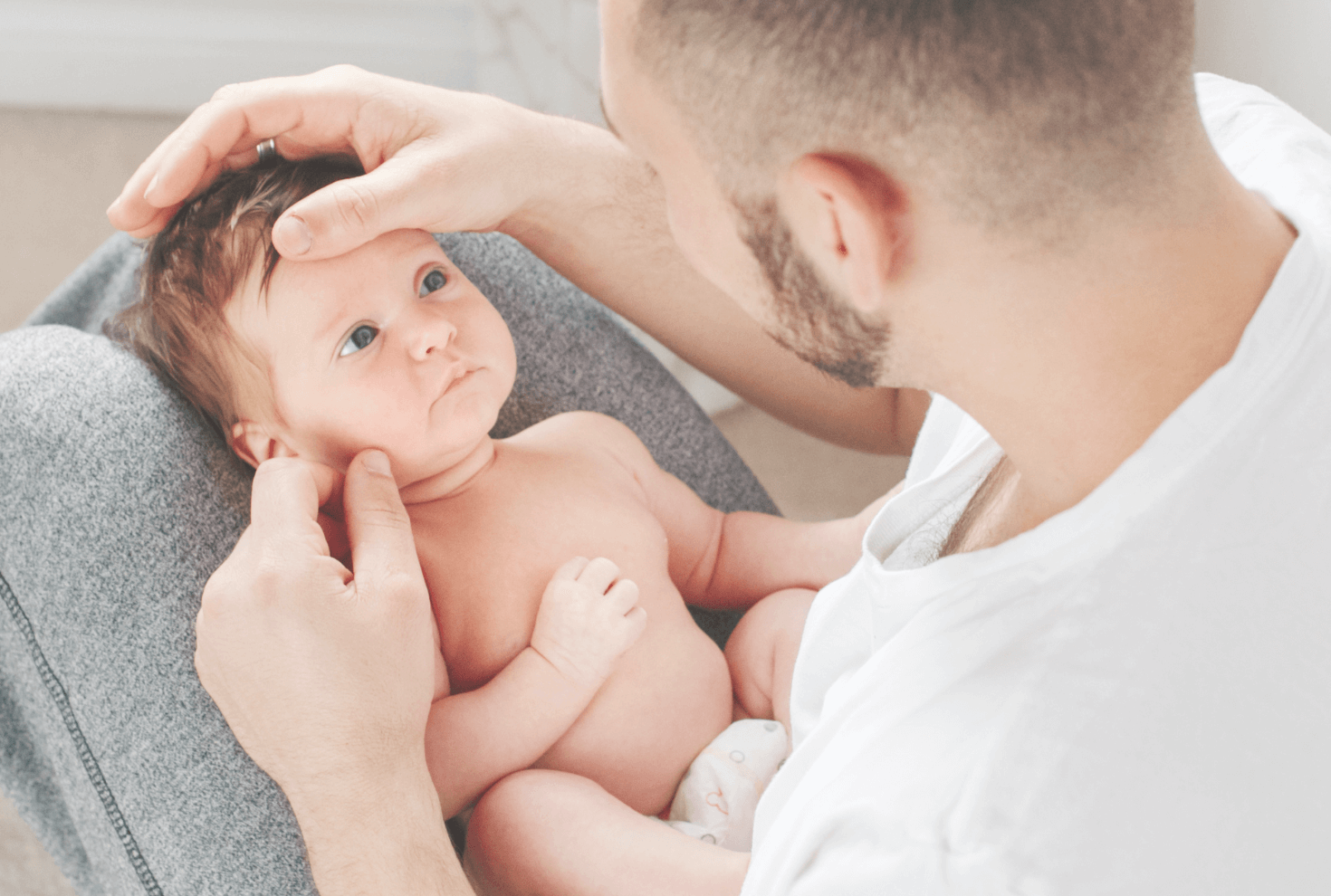 Dad holding baby