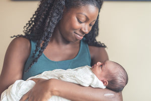 Mom Holding Newborn Baby